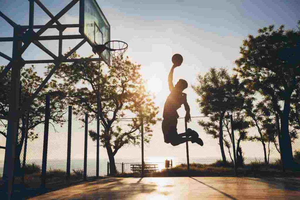 a guy playing basketball