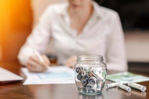 image depicting financial assistance due to the jar of money