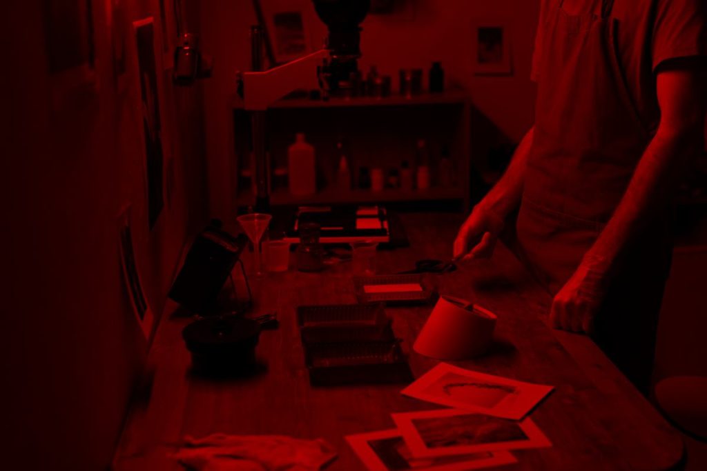 side-view-man-developing-photos