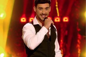 man with a mic at a talent show